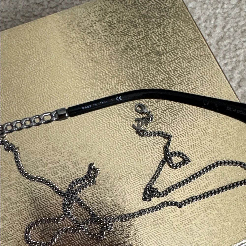 Chanel Women's Round-shape 4245
Sunglasses Black Coco Eyewear Frame With Chain - Picture 7 of 12